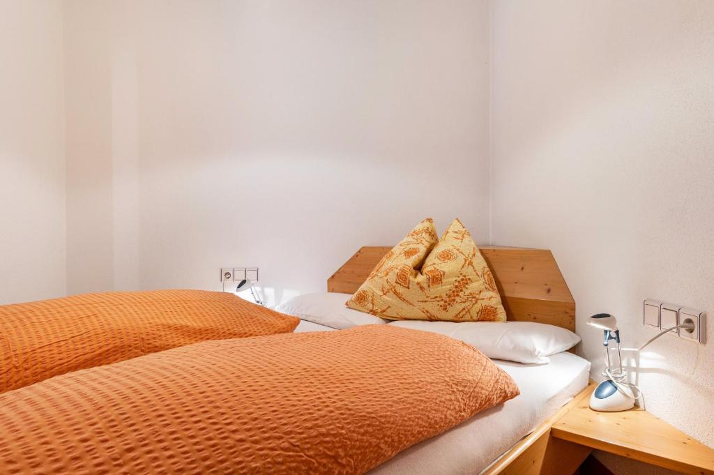 Postel nebo postele na pokoji v ubytování Appartments Reichegger