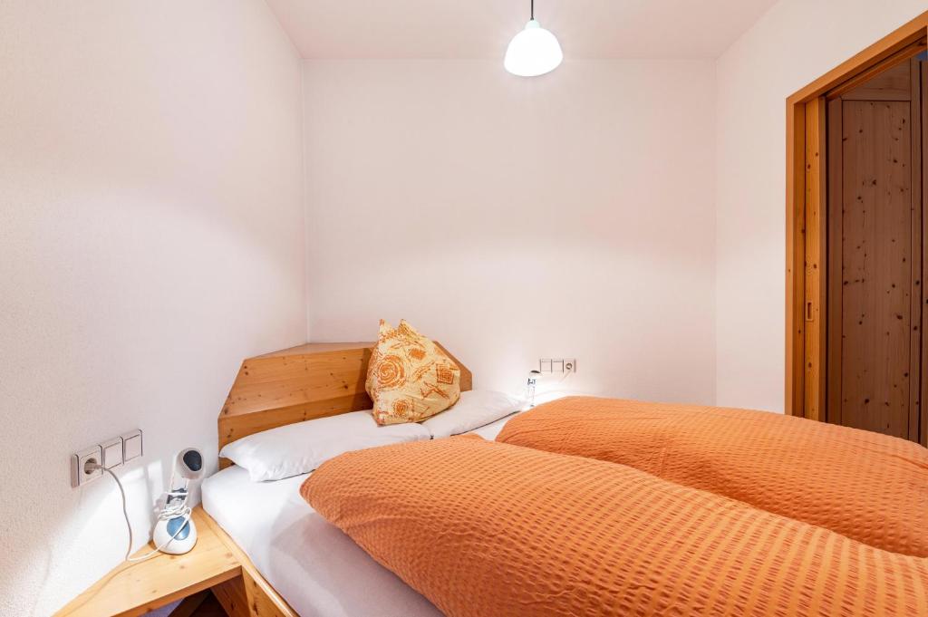 Postel nebo postele na pokoji v ubytování Appartments Reichegger