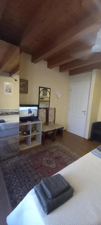 Postel nebo postele na pokoji v ubytování B&B Palmagrill