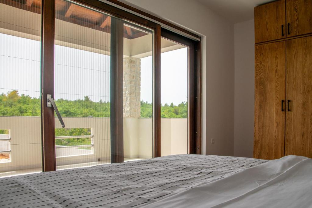 Krevet ili kreveti u jedinici u objektu New Serenity Zen Garden Villa