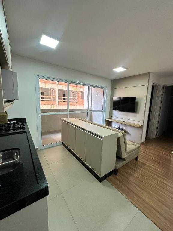 Kuchyň nebo kuchyňský kout v ubytování Apartamento com lazer e spa