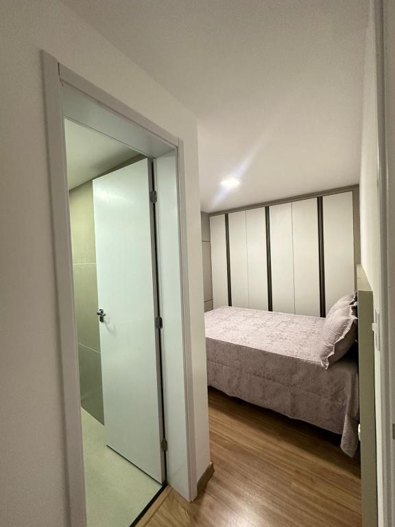 Postel nebo postele na pokoji v ubytování Apartamento com lazer e spa