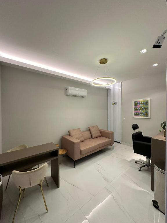 Posezení v ubytování Apartamento com lazer e spa