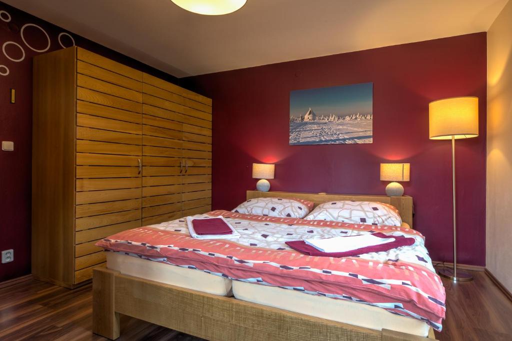 Postel nebo postele na pokoji v ubytování Apartmány Barto21