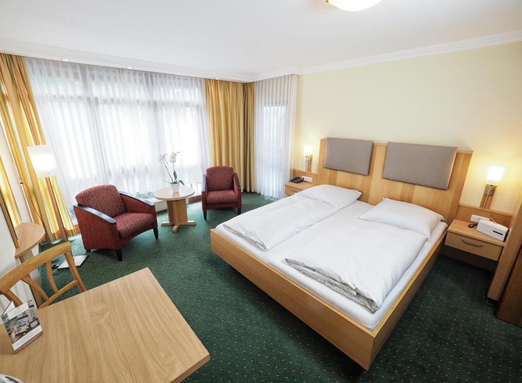 Postel nebo postele na pokoji v ubytování City Appartementhotel