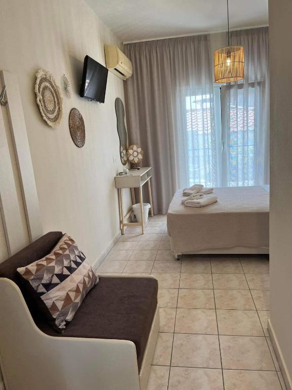 Postel nebo postele na pokoji v ubytování Pella Hotel - new