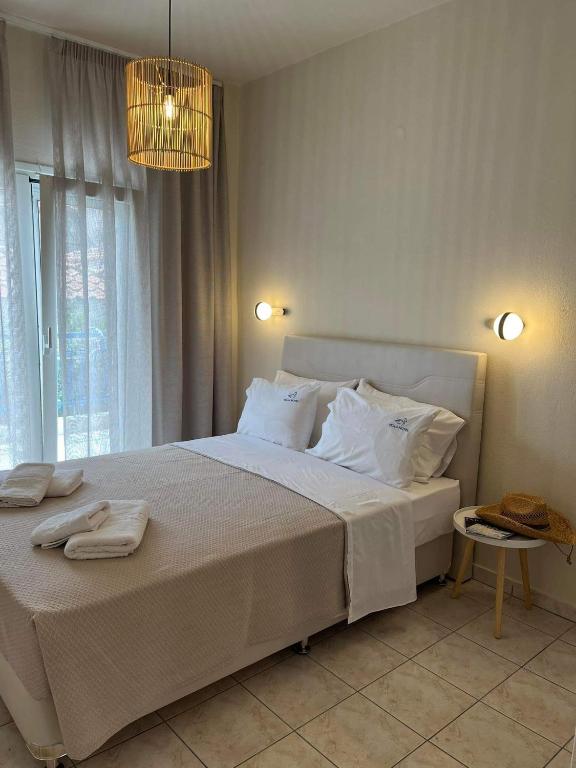 Postel nebo postele na pokoji v ubytování Pella Hotel - new
