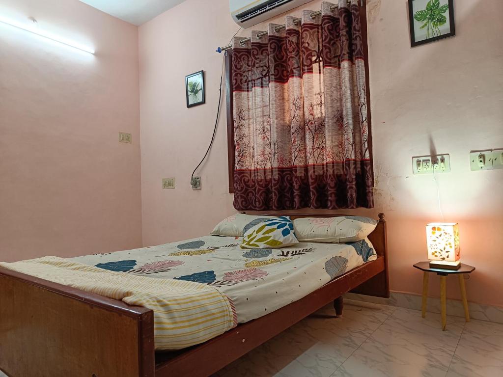 Postel nebo postele na pokoji v ubytování Rest and Relax Homestay