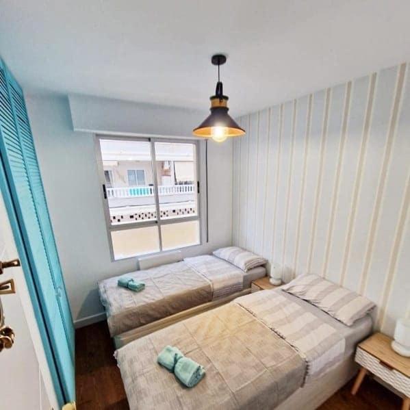 Postel nebo postele na pokoji v ubytování Apartament Goleta