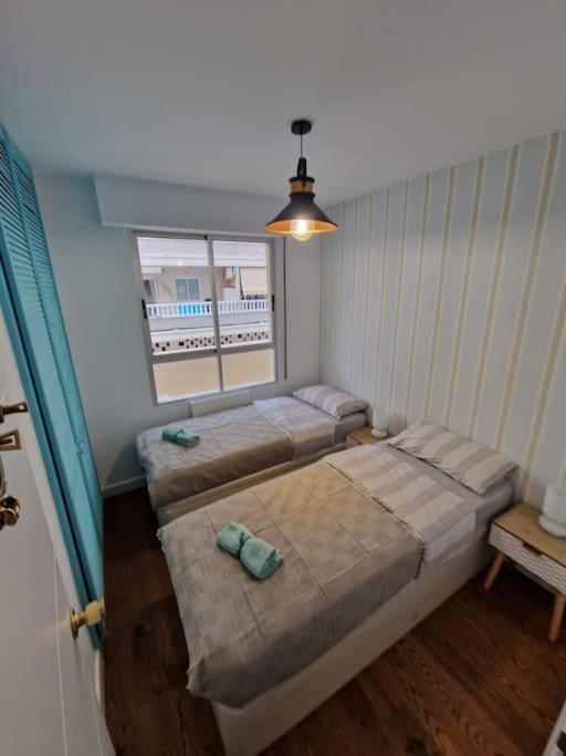 Postel nebo postele na pokoji v ubytování Apartament Goleta