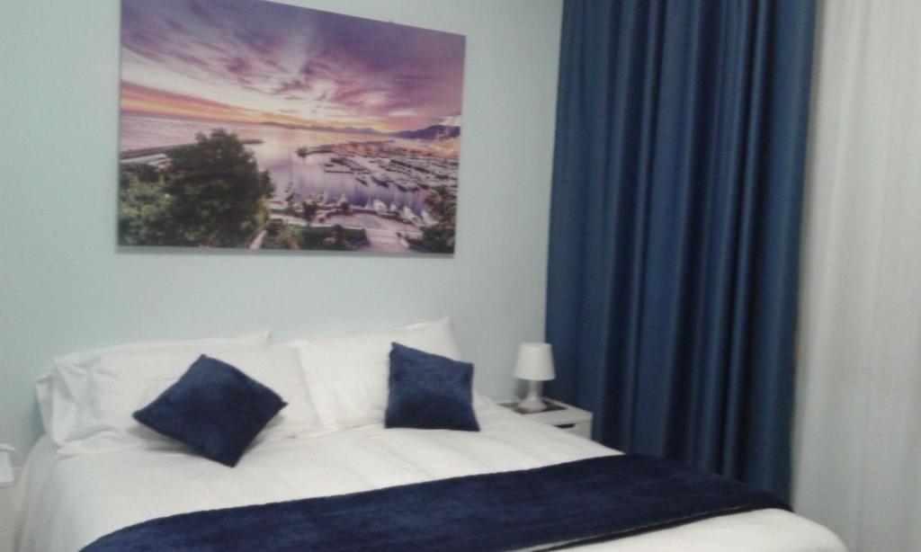 Posteľ alebo postele v izbe v ubytovaní B&b Bagheria