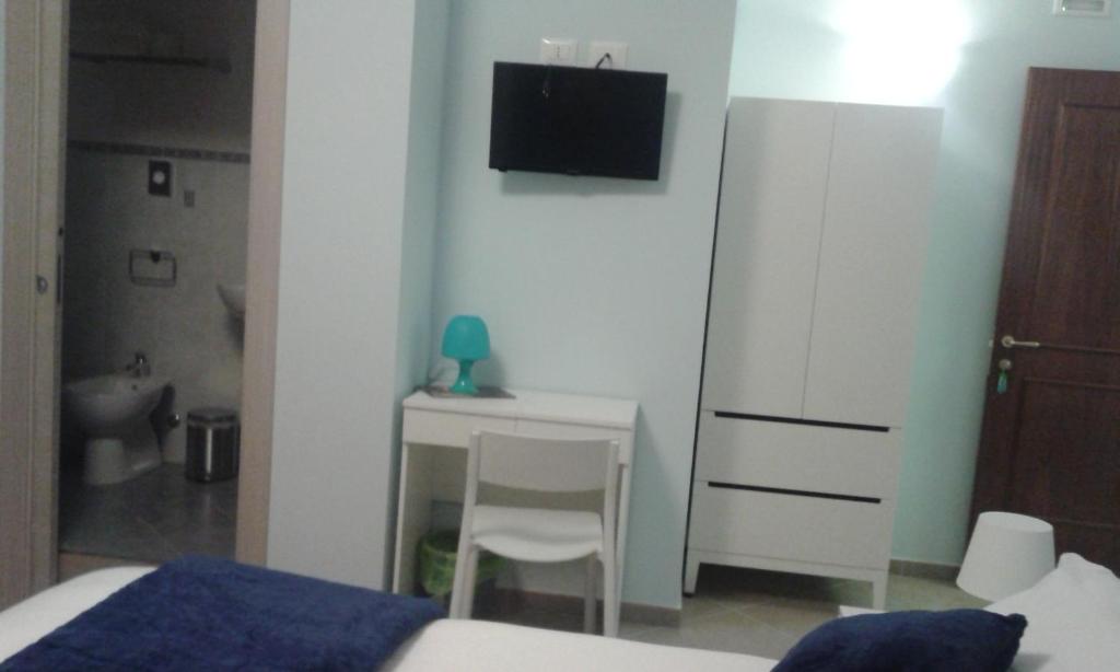 Posteľ alebo postele v izbe v ubytovaní B&b Bagheria