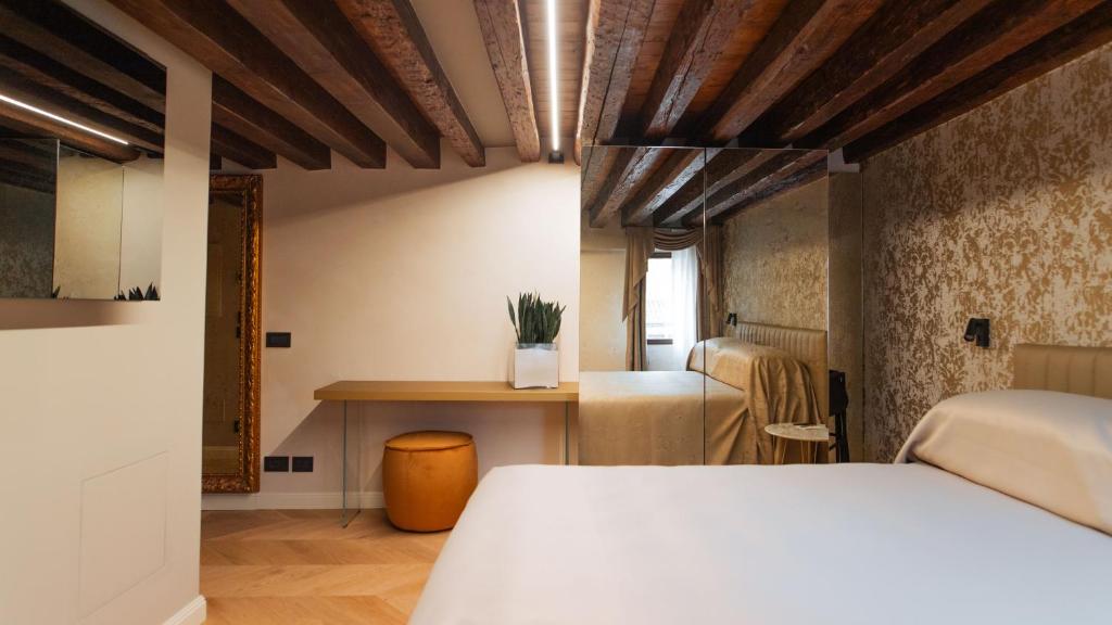 Postel nebo postele na pokoji v ubytování Palazzetto MyVenice