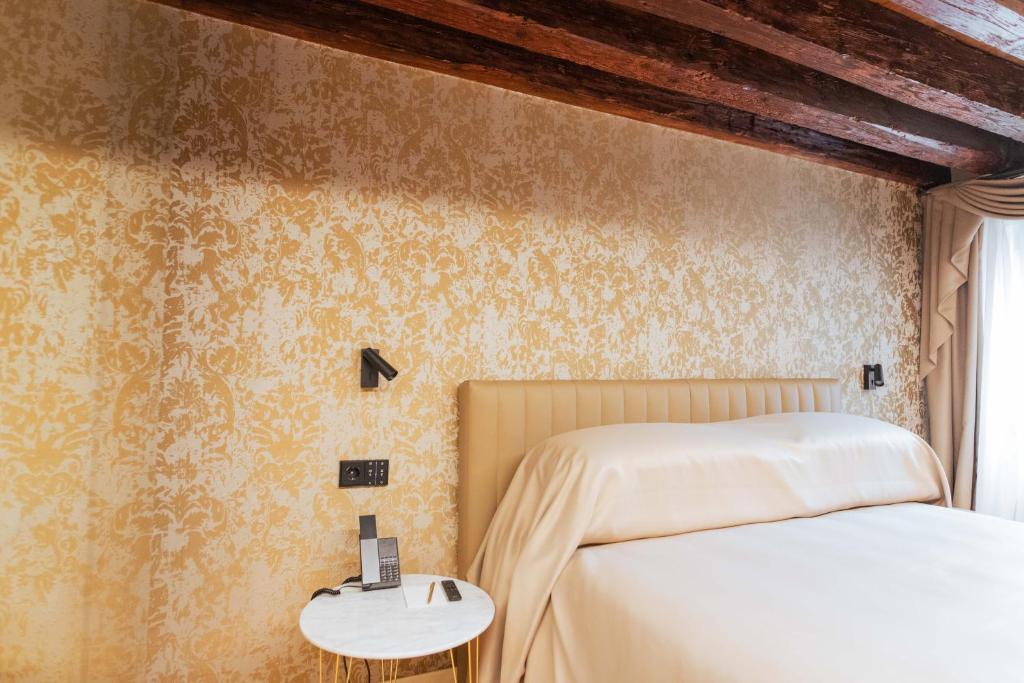 Postel nebo postele na pokoji v ubytování Palazzetto MyVenice