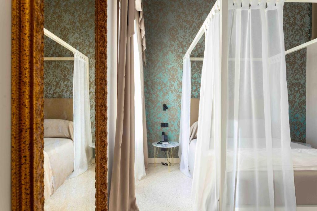Postel nebo postele na pokoji v ubytování Palazzetto MyVenice
