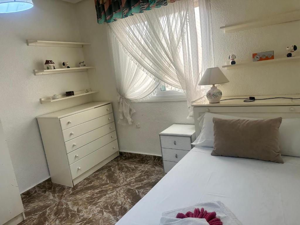 Posteľ alebo postele v izbe v ubytovaní Homely Apartments Centro