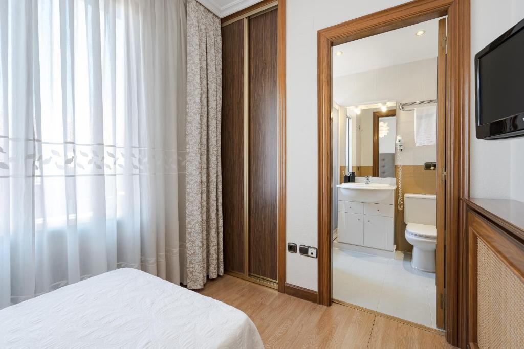Postel nebo postele na pokoji v ubytování Hotel Eurowest