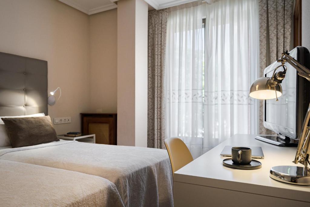 Postel nebo postele na pokoji v ubytování Hotel Eurowest