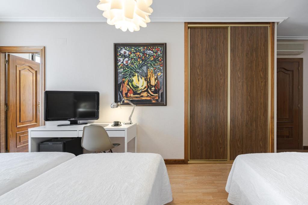 TV a/nebo společenská místnost v ubytování Hotel Eurowest