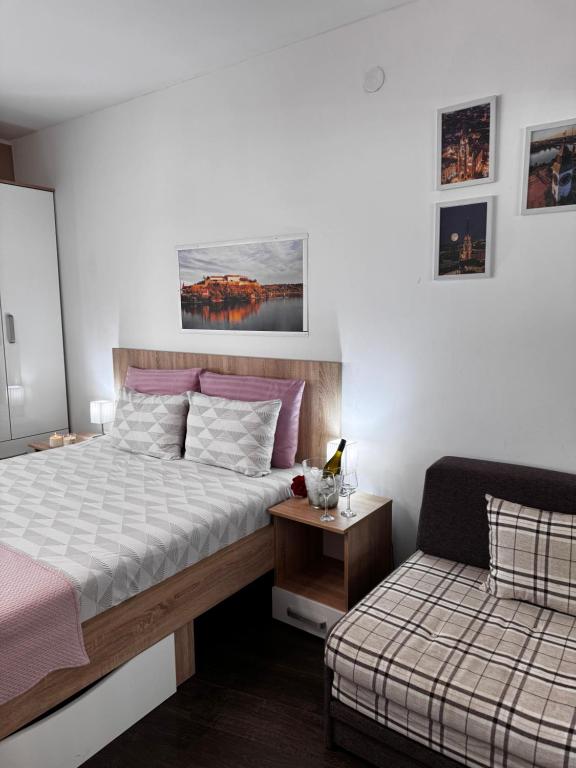 Postel nebo postele na pokoji v ubytování Post apartmani A-1