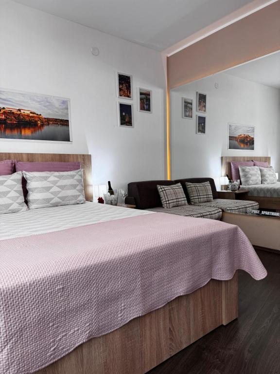 Postel nebo postele na pokoji v ubytování Post apartmani A-1