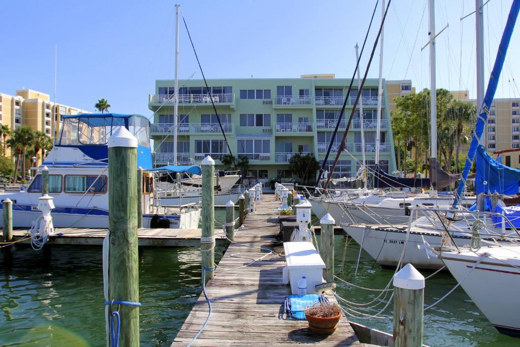 boats are docked at a marina at Chart House Suites on Clearwater Bay in Clearwater Beach