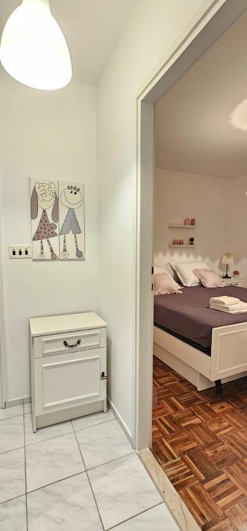 Posteľ alebo postele v izbe v ubytovaní LUKA APARTMENT