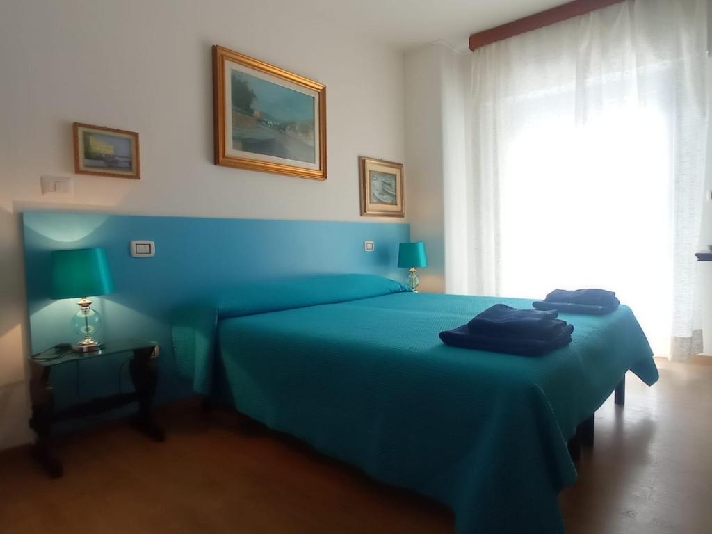 Postel nebo postele na pokoji v ubytování Villa Teodora
