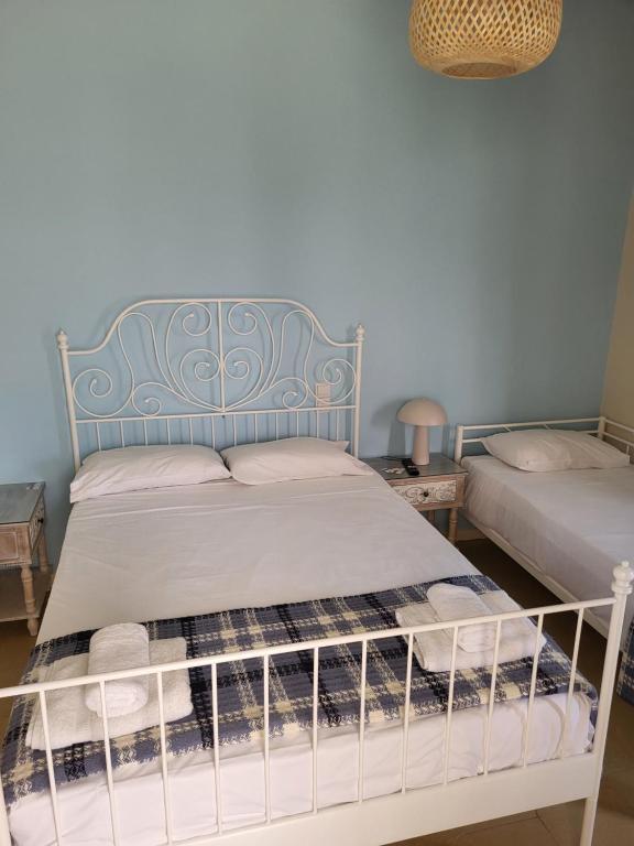 A bed or beds in a room at Margarita rooms