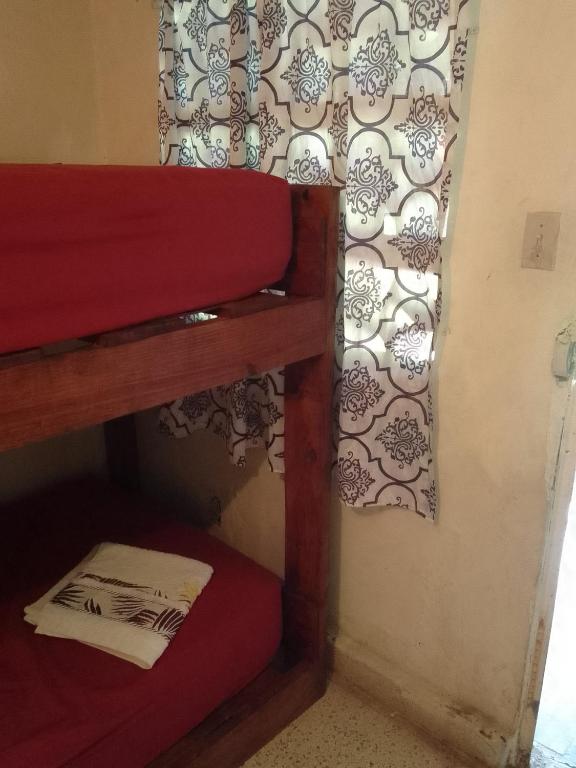 Postel nebo postele na pokoji v ubytování Waterfall Hostel