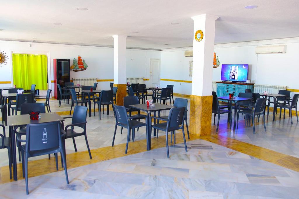 TV a/nebo společenská místnost v ubytování Hotel Marazul