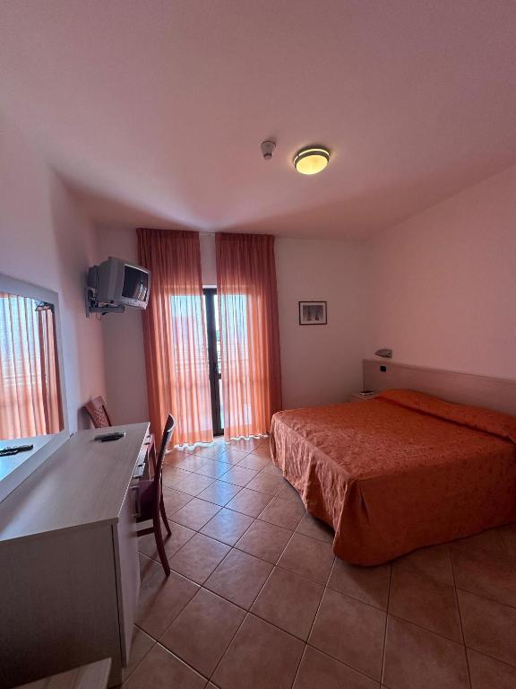 Postel nebo postele na pokoji v ubytování Athena Palace Hotel