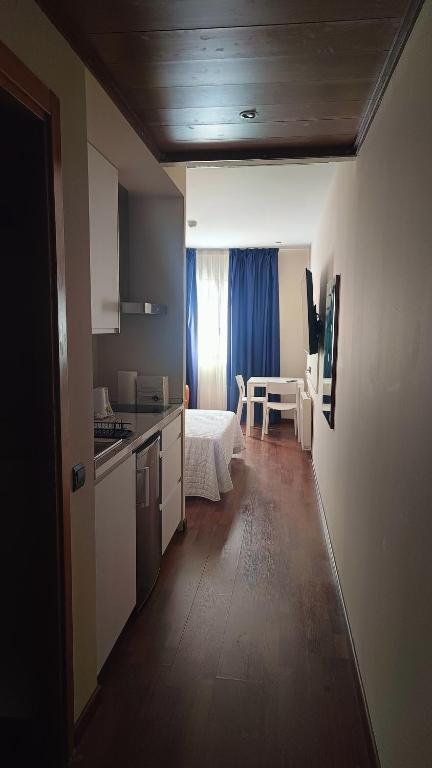 Kuchyň nebo kuchyňský kout v ubytování Hotel Suite Camarena