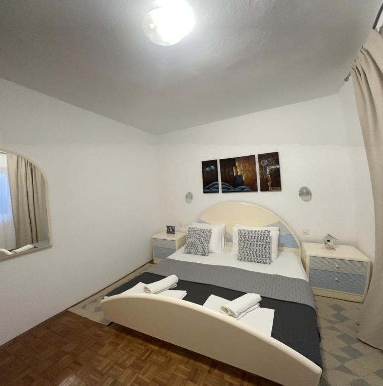 Postel nebo postele na pokoji v ubytování Apartments Oxygen