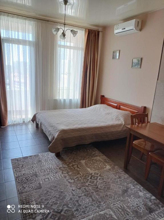 Postel nebo postele na pokoji v ubytování Genuez