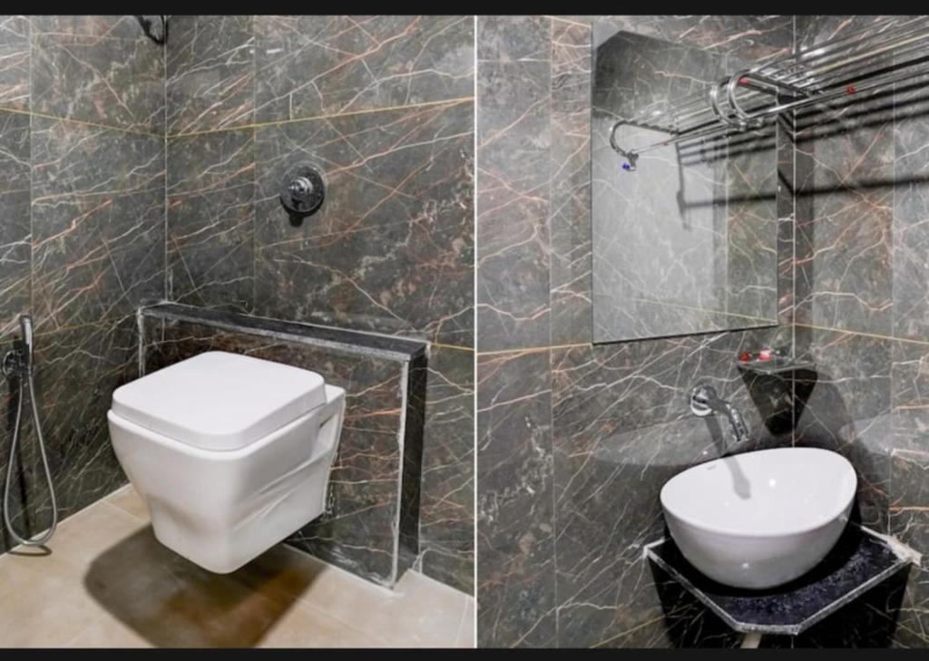 Koupelna v ubytování Hotel Shubham Inn Thaltej Ahmedabad