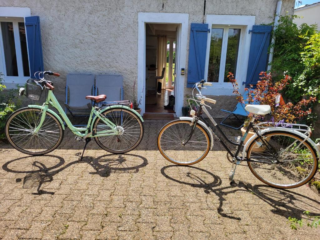 two bikes parked in front of a house at blu dragonfly in Saint-Aubin-sur-Loire