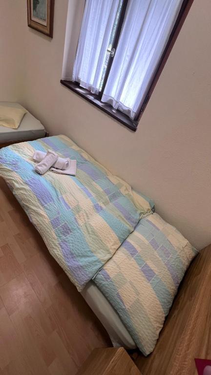 Postel nebo postele na pokoji v ubytování Grott Di Baloi