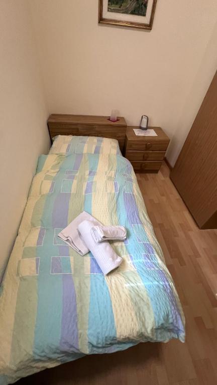 Postel nebo postele na pokoji v ubytování Grott Di Baloi
