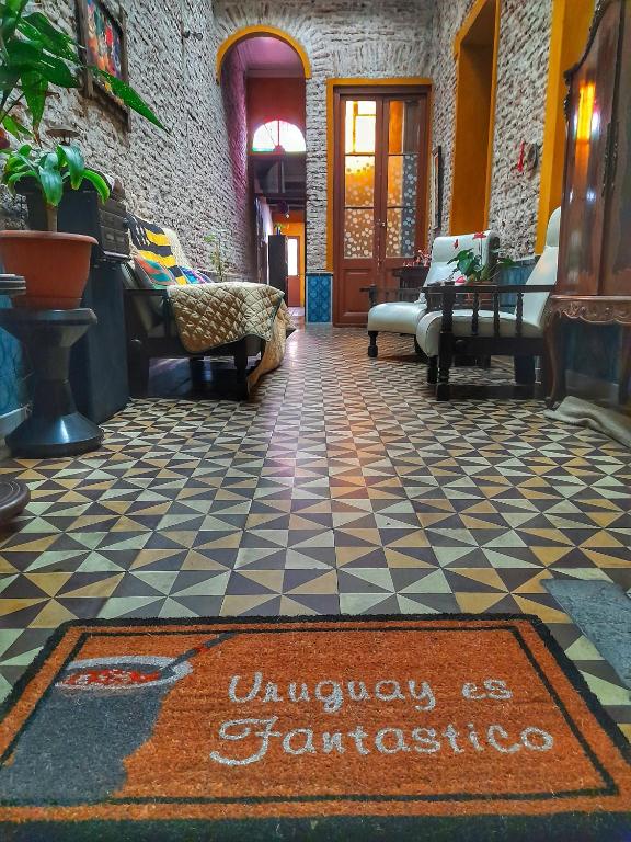 a lobby with a welcome mat on the floor at El Patio de la Morocha in Montevideo