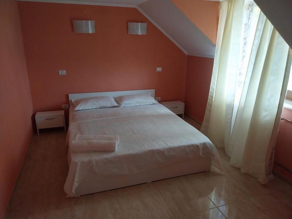Postel nebo postele na pokoji v ubytování Serena House