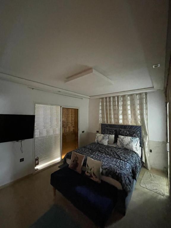 Ένα ή περισσότερα κρεβάτια σε δωμάτιο στο Résidence miramar beach