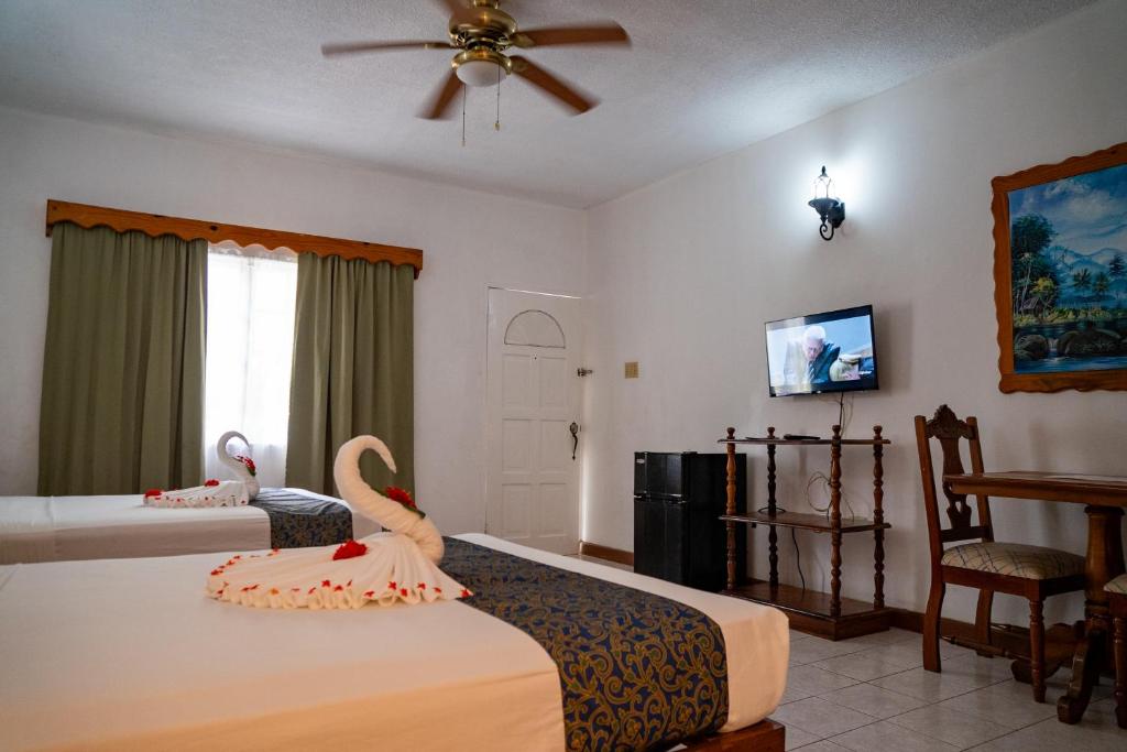Letto o letti in una camera di Merrils Beach Resort II