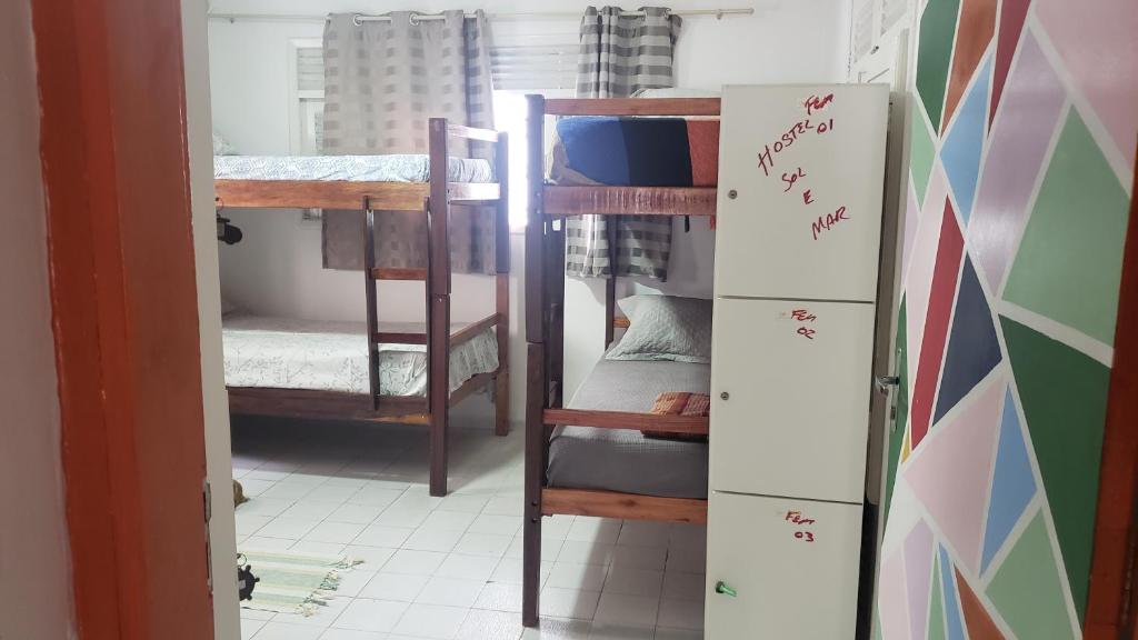 Postel nebo postele na pokoji v ubytování Pousada e Hostel Sol e Mar