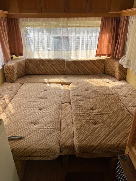 Postel nebo postele na pokoji v ubytování Karavan