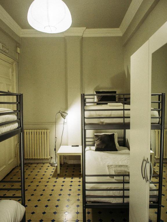 Postel nebo postele na pokoji v ubytování Zentric Hostel