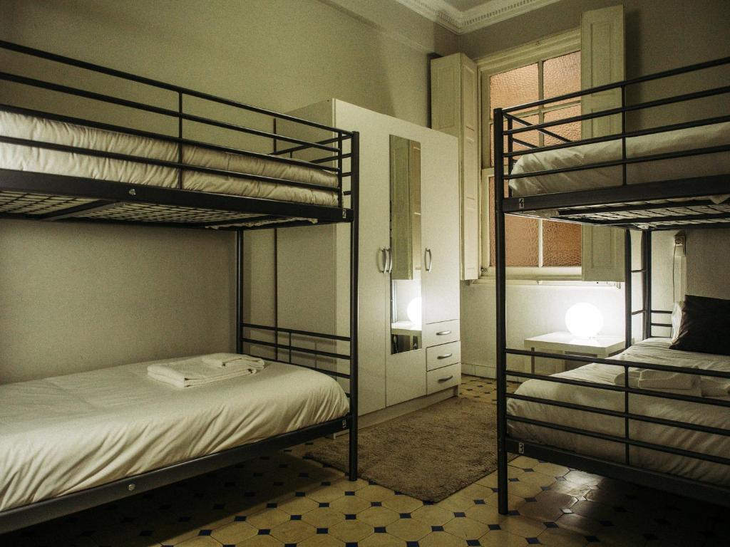 Postel nebo postele na pokoji v ubytování Zentric Hostel