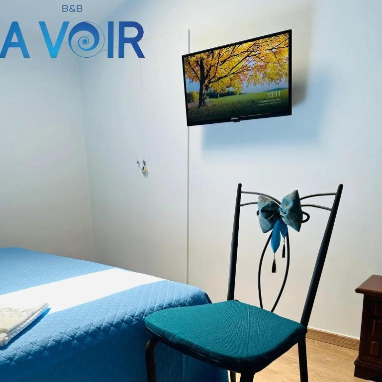 TV a/nebo společenská místnost v ubytování B&B A Voir