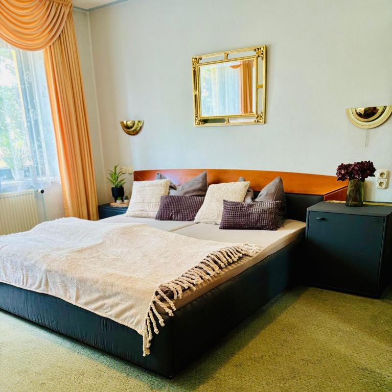 Postel nebo postele na pokoji v ubytování Themenhotel Rehlein
