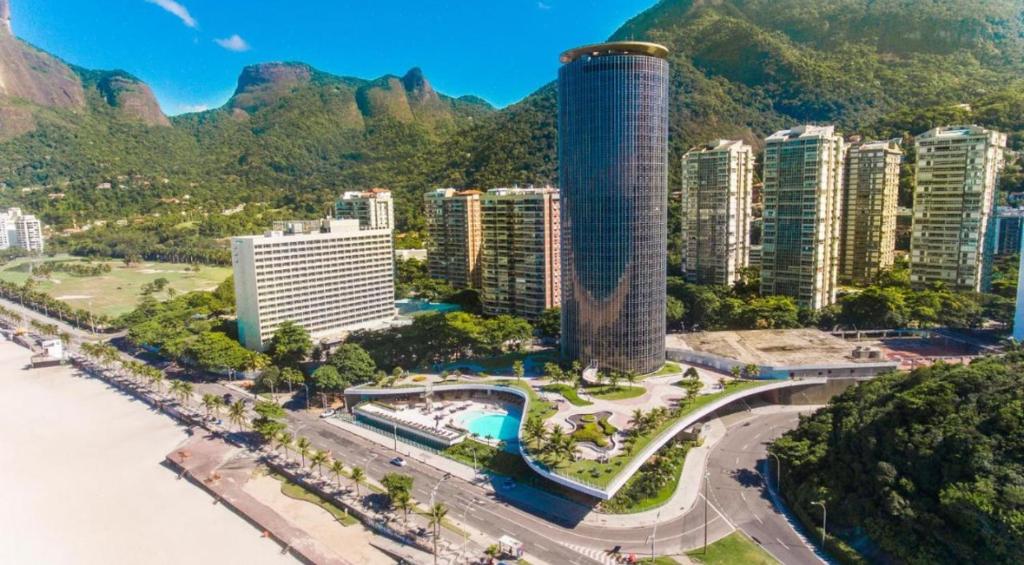 an aerial view of a city with mountains and buildings at Hotel Nacional in Rio de Janeiro
